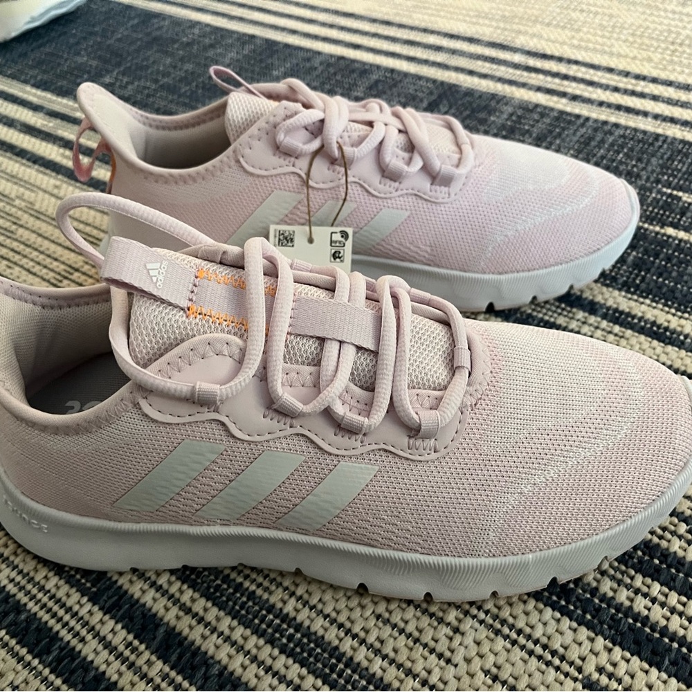 Brand new with tags! Pale pink Adidas sneakers. Never worn